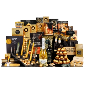 Het serveerschaal kerstpakket bevat een schaal, lekkernijen en dranken waarmee je je visite kunt serveren.